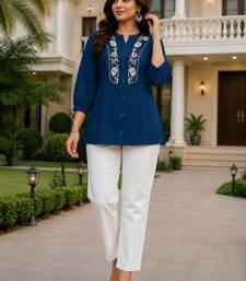 Teal embroidered short tunic kurti with off-white bottom set