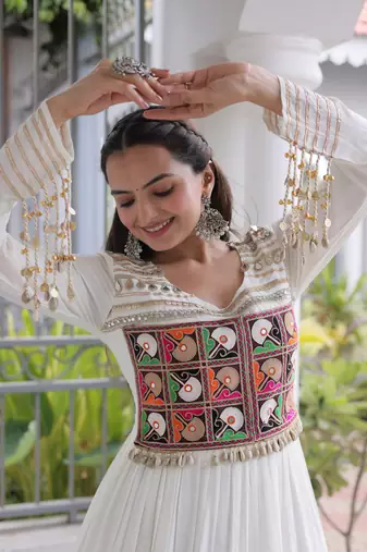 white rayon kutchi gamthi thread embroidered mirror work  flair gown