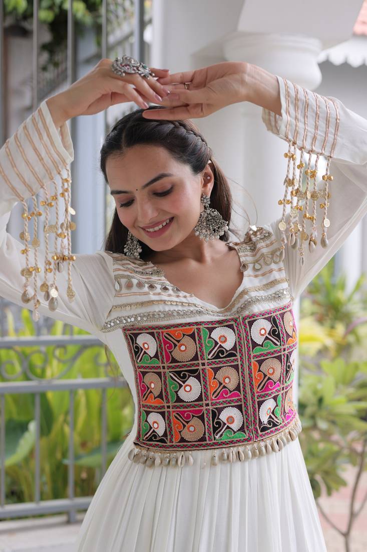 white rayon kutchi gamthi thread embroidered mirror work  flair gown