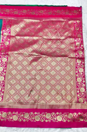 rama zari woven banarasi silk blend traditional saree with blouse piece