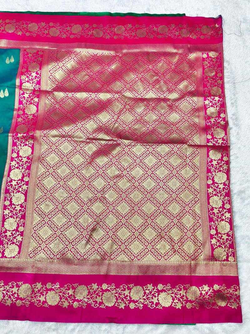 rama zari woven banarasi silk blend traditional saree with blouse piece