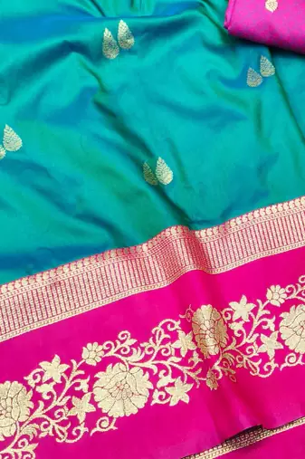 rama zari woven banarasi silk blend traditional saree with blouse piece