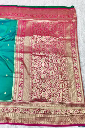 rama zari woven banarasi silk blend traditional saree with blouse piece