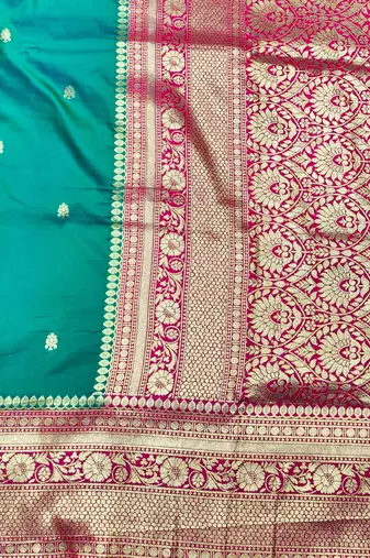 rama zari woven banarasi silk blend traditional saree with blouse piece