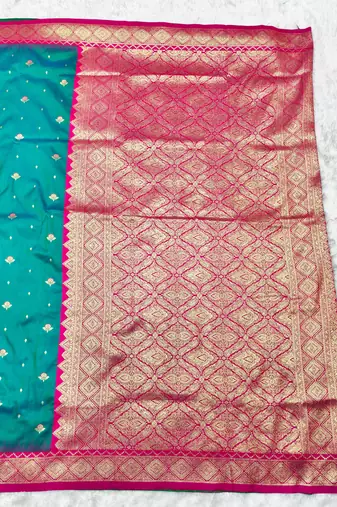 rama zari woven banarasi silk blend traditional saree with blouse piece