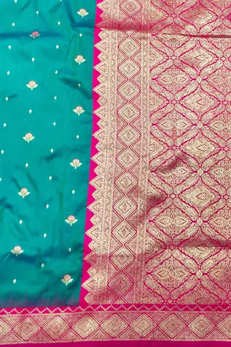 rama zari woven banarasi silk blend traditional saree with blouse piece