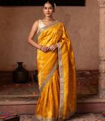 Yellow embroidered pure katan silk saree