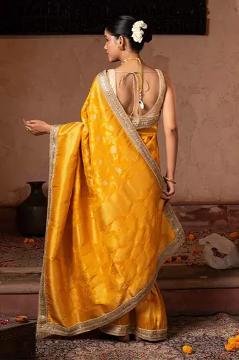 Yellow embroidered pure katan silk saree