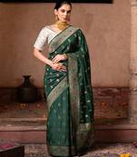 Green embroidered pure katan silk saree
