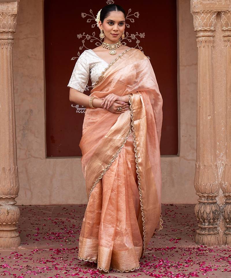 Peach embroidered pure tissue silk saree