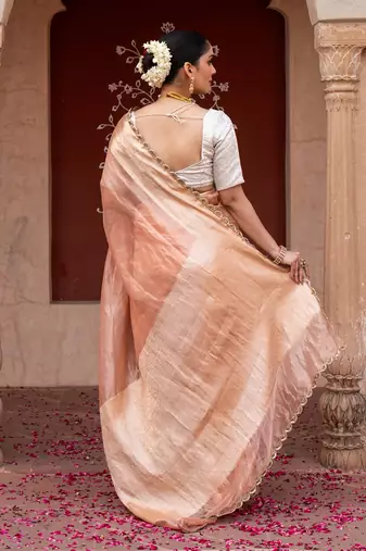 Peach embroidered pure tissue silk saree