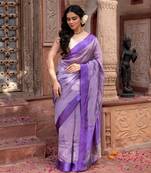 Purple embroidered pure tissue silk saree