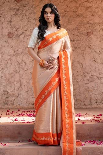 Orange embroidered pure tissue silk saree