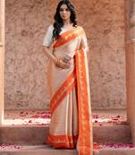 Orange embroidered pure tissue silk saree