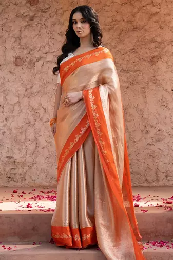 Orange embroidered pure tissue silk saree