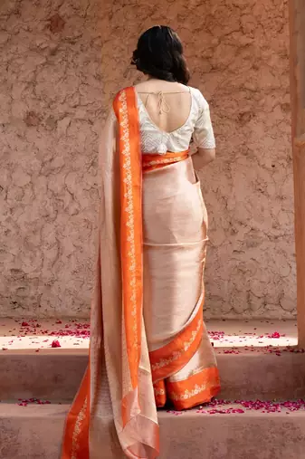 Orange embroidered pure tissue silk saree