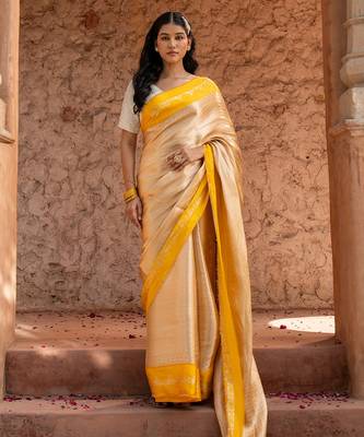 Yellow embroidered pure tissue silk saree 1