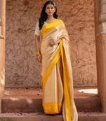 Yellow embroidered pure tissue silk saree