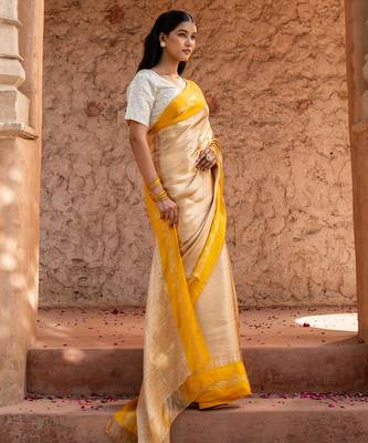 Yellow embroidered pure tissue silk saree 2