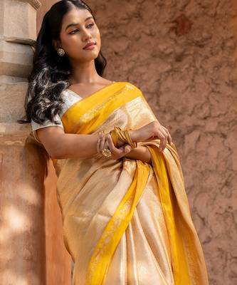 Yellow embroidered pure tissue silk saree 3