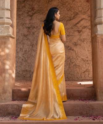 Yellow embroidered pure tissue silk saree 4