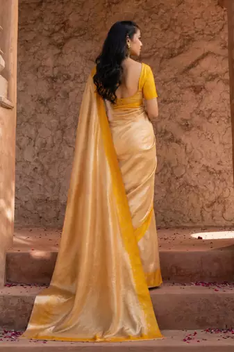 Yellow embroidered pure tissue silk saree
