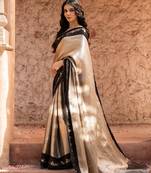 Black embroidered pure tissue silk saree
