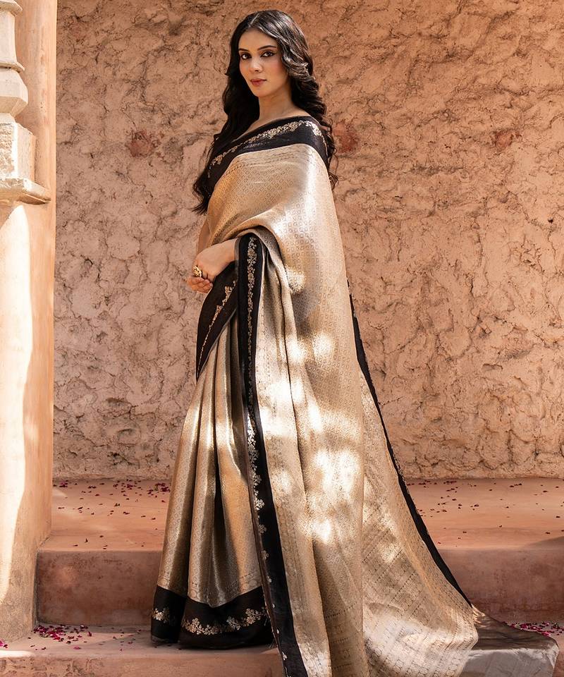 Black embroidered pure tissue silk saree