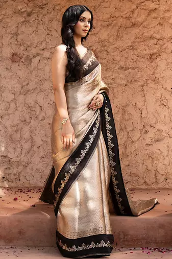 Black embroidered pure tissue silk saree