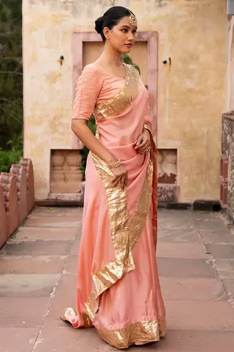 Peach embroidered pure tissue silk saree