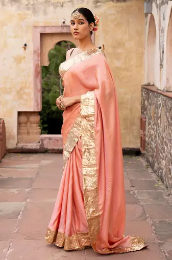 Peach embroidered pure tissue silk saree