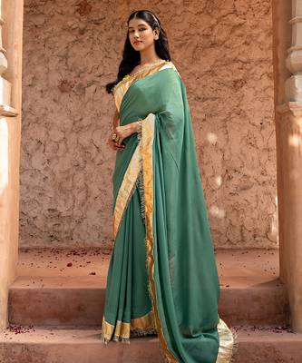 Sage green embroidered pure georgette saree 2