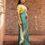 Sage green embroidered pure georgette saree