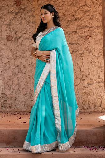 Sky blue embroidered pure georgette saree