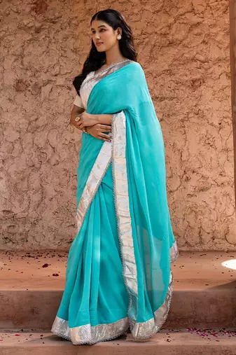 Sky blue embroidered pure georgette saree