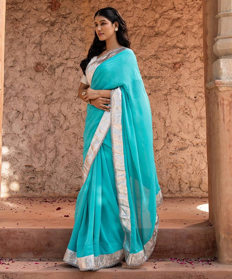 Sky blue embroidered pure georgette saree