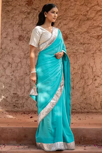 Sky blue embroidered pure georgette saree