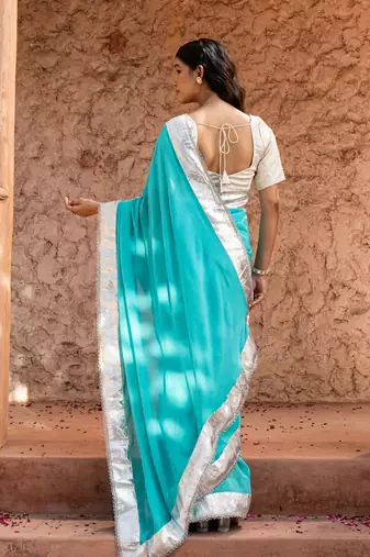 Sky blue embroidered pure georgette saree