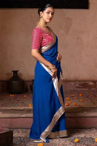 Royal blue embroidered pure georgette saree