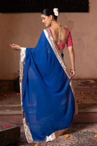 Royal blue embroidered pure georgette saree