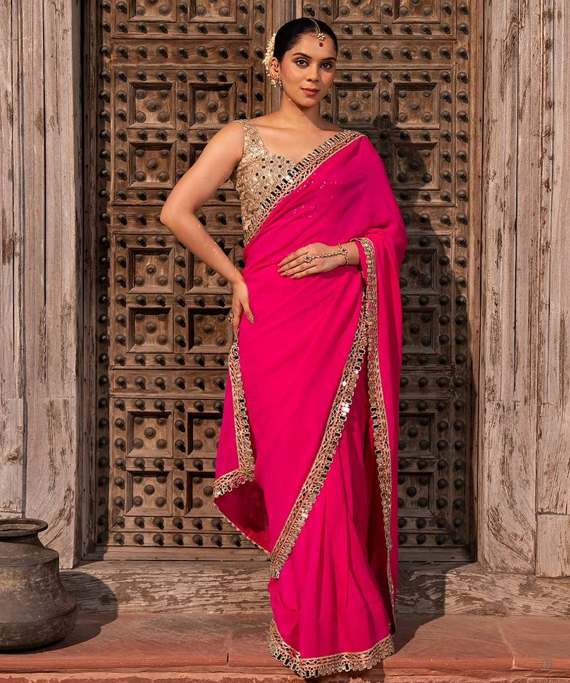 Fuschia pink embroidered pure georgette saree