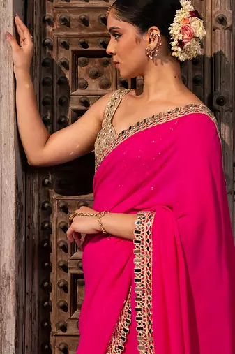 Fuschia pink embroidered pure georgette saree
