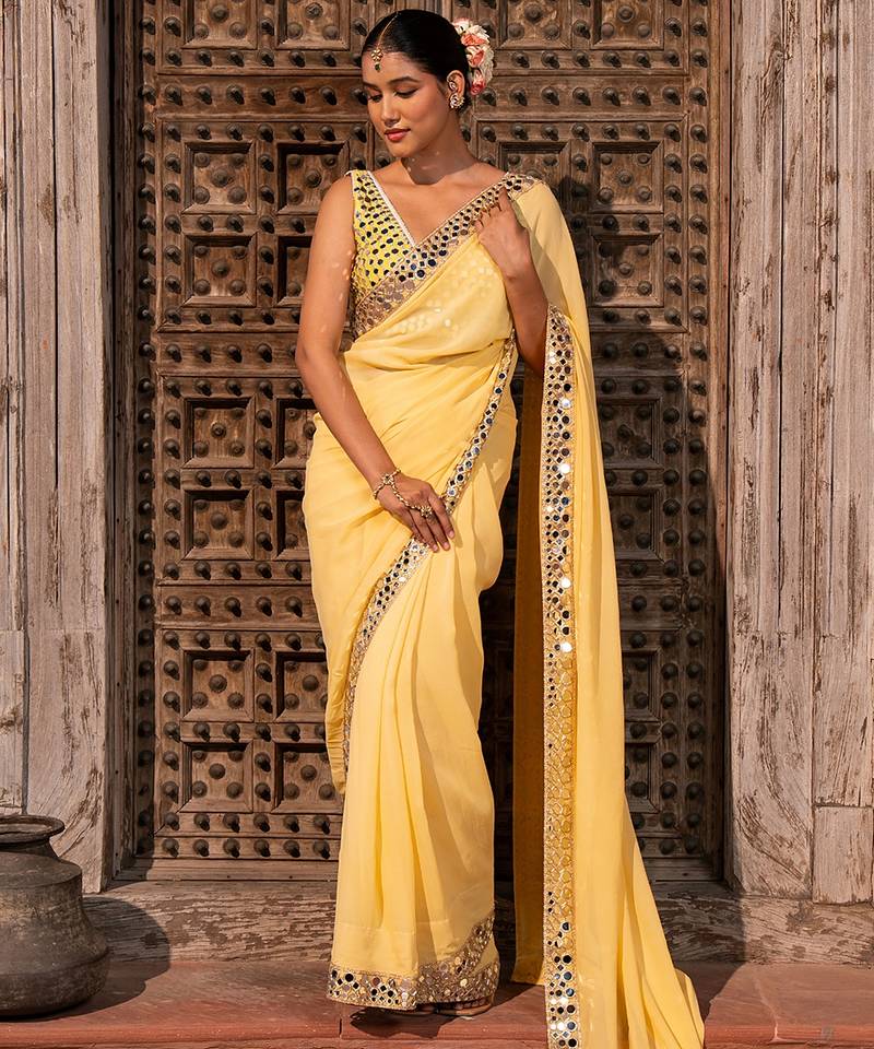 Butter yellow embroidered pure georgette saree