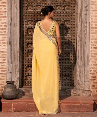 Butter yellow embroidered pure georgette saree 3