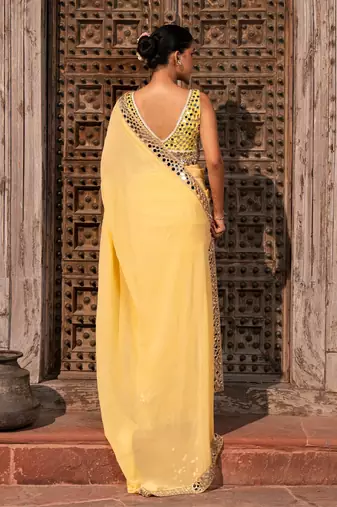 Butter yellow embroidered pure georgette saree