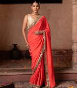 Coral orange embroidered pure georgette saree