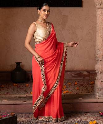 Coral orange embroidered pure georgette saree 2