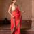 Coral orange embroidered pure georgette saree