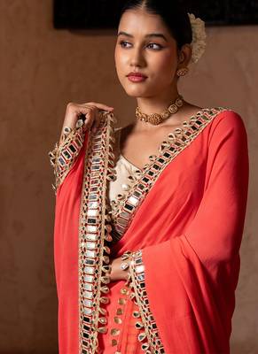 Coral orange embroidered pure georgette saree 4