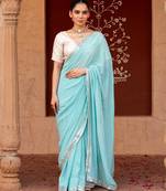 Sky blue embroidered pure georgette saree